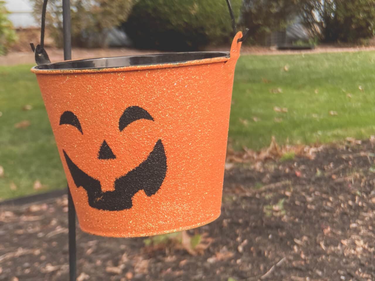 A festive orange halloween bucket.