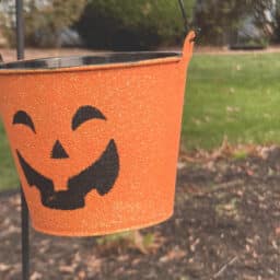 A festive orange halloween bucket.