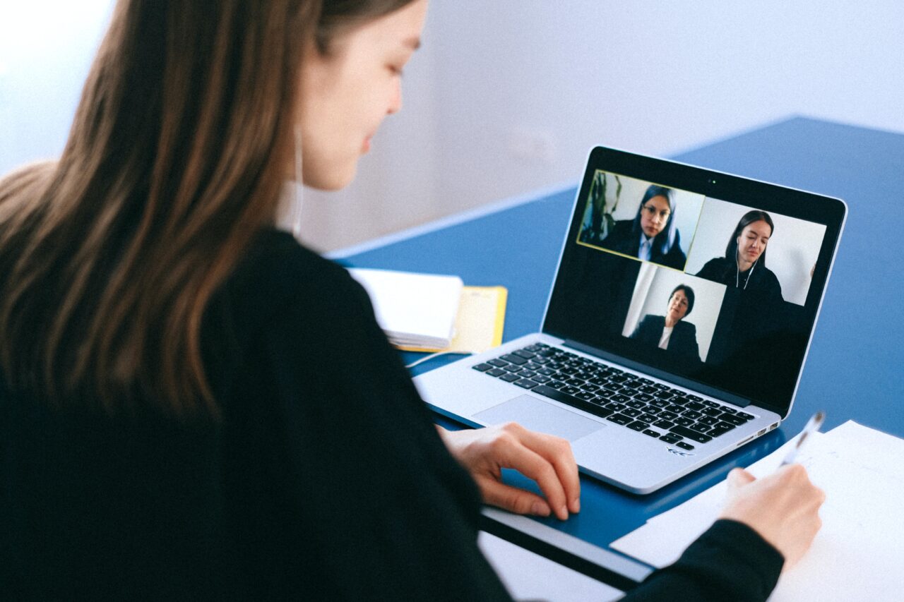 Young woman having a video meeting on her laptop.