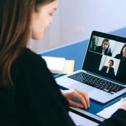 Young woman having a video meeting on her laptop.