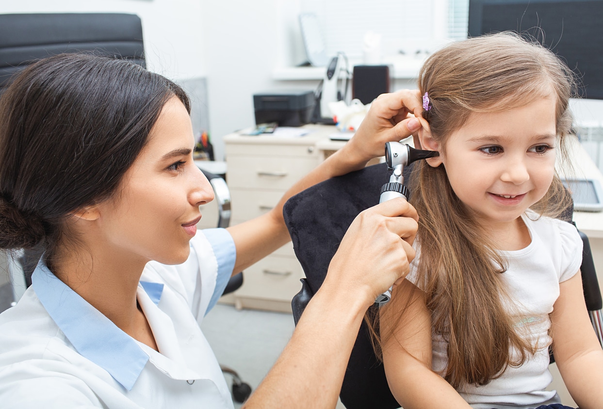Young girl in an ear exam.
