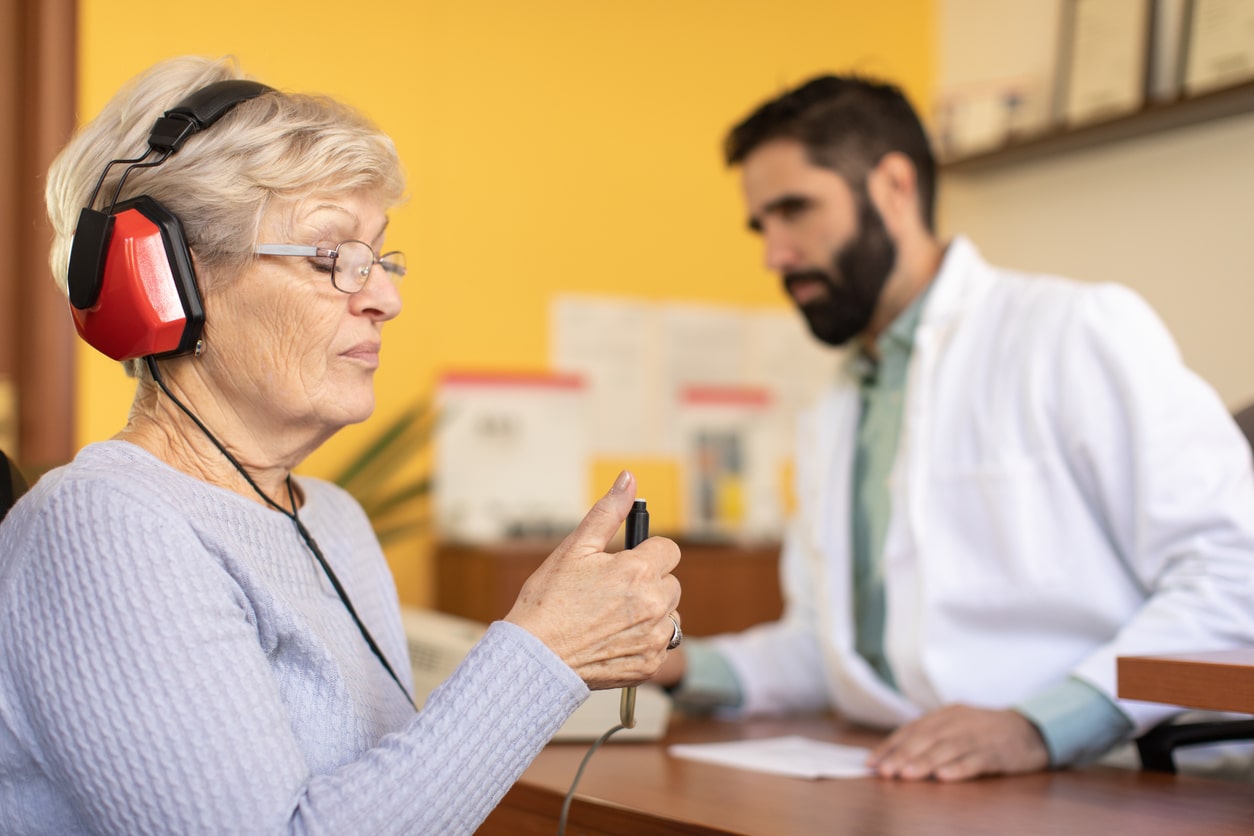 Senior audiology appointment.